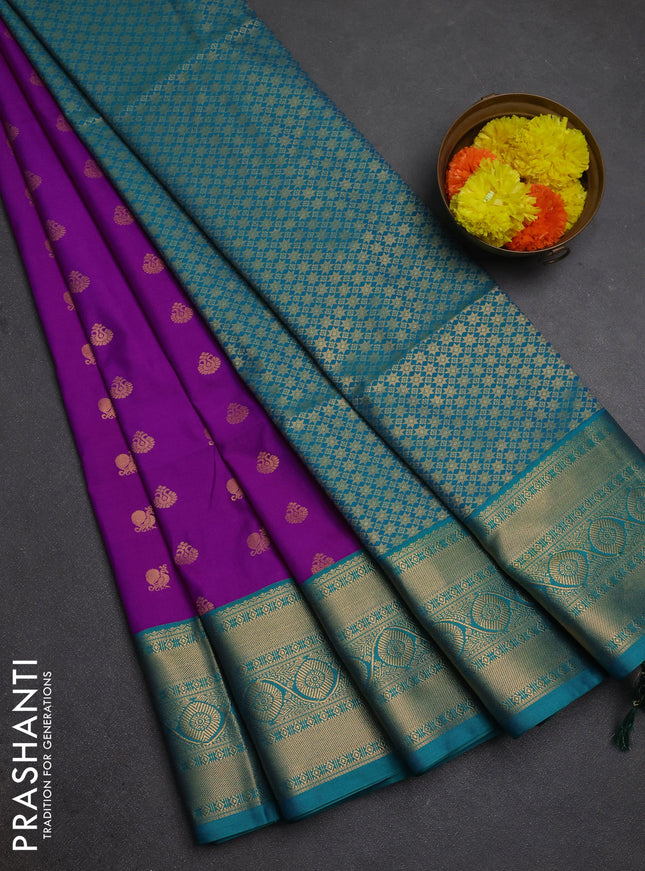 Semi soft silk saree magenta pink and teal green with allover zari woven buttas and zari woven border