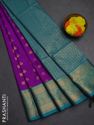 Semi soft silk saree magenta pink and teal green with allover zari woven buttas and zari woven border