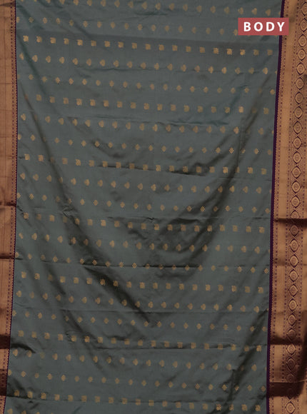 Semi soft silk saree grey shade and purple with allover zari woven buttas and zari woven border