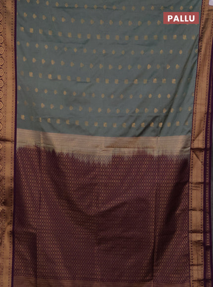 Semi soft silk saree grey shade and purple with allover zari woven buttas and zari woven border