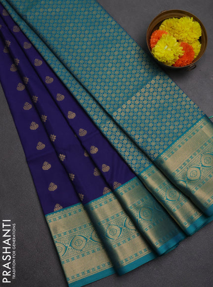 Semi soft silk saree navy blue and teal green with allover zari woven buttas and zari woven border