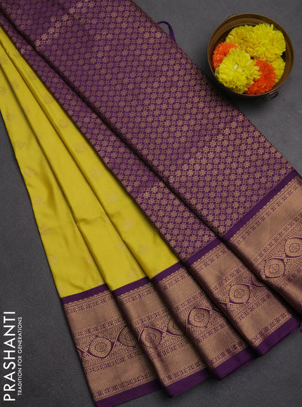 Semi soft silk saree lime yellow and purple with allover zari woven buttas and zari woven border