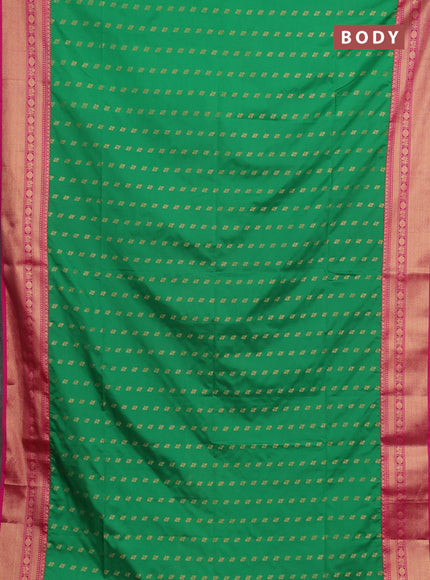 Semi soft silk saree green and pink with allover zari woven buttas and zari woven border