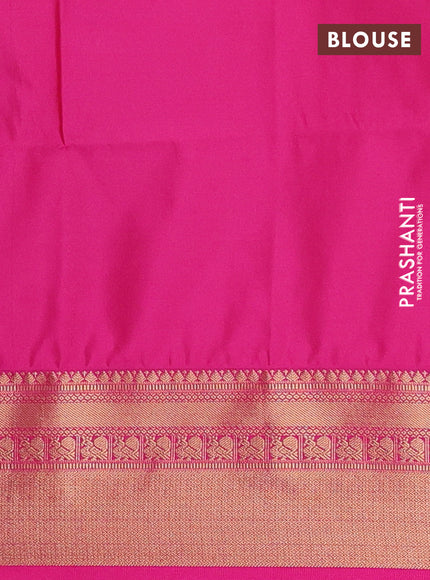 Semi soft silk saree green and pink with allover zari woven buttas and zari woven border