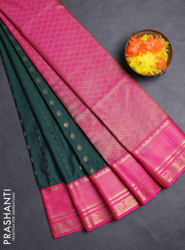 Semi soft silk saree bottle green and pink with allover zari woven buttas and zari woven border