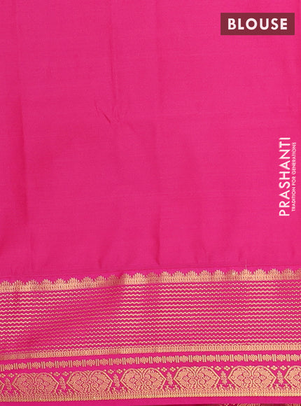 Semi soft silk saree bottle green and pink with allover zari woven buttas and zari woven border