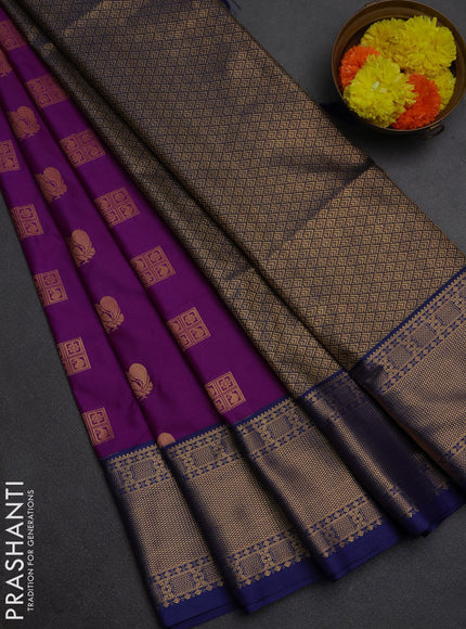 Semi soft silk saree magenta pink and blue with allover zari woven buttas and zari woven border