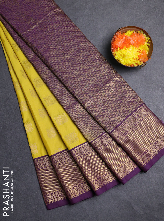 Semi soft silk saree lime yellow and purple with allover zari woven buttas and zari woven border