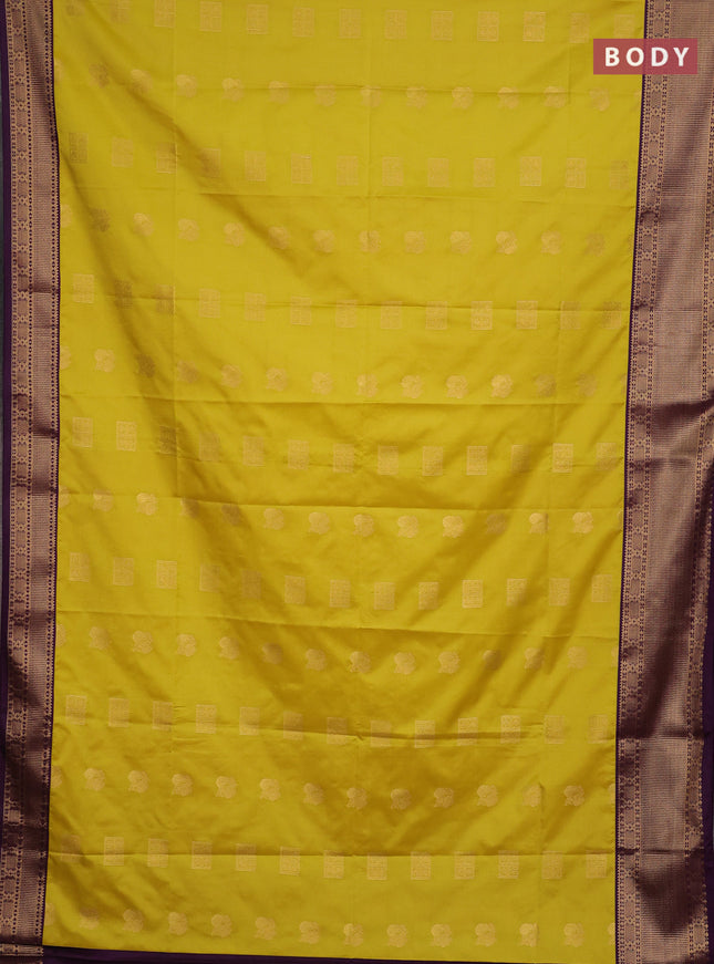 Semi soft silk saree lime yellow and purple with allover zari woven buttas and zari woven border