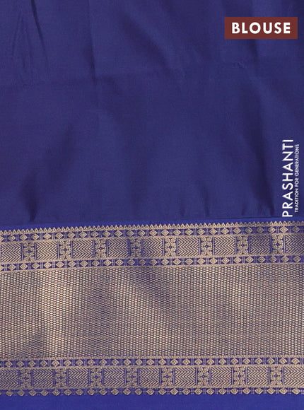 Semi soft silk saree dual shade of pinkish orange and blue with allover zari woven buttas and zari woven border
