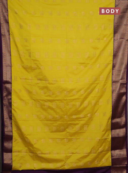 Semi soft silk saree yellow and purple with allover zari woven buttas and zari woven border