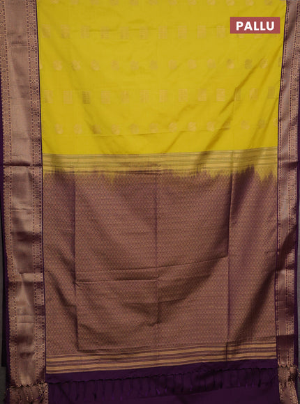 Semi soft silk saree yellow and purple with allover zari woven buttas and zari woven border