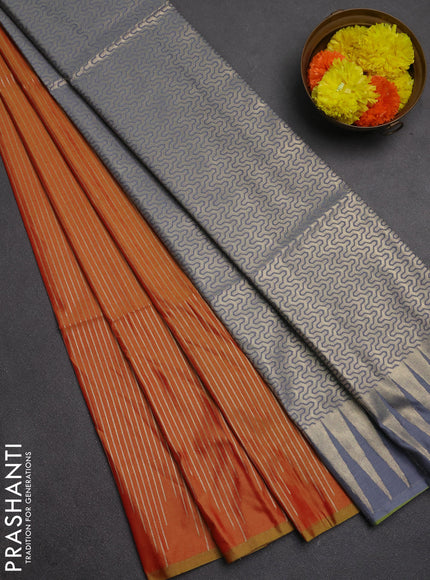 Semi soft silk saree sunset orange and grey with allover zari weaves in borderless style