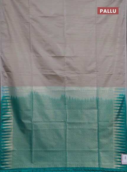 Semi soft silk saree grey and teal green with allover zari weaves in borderless style