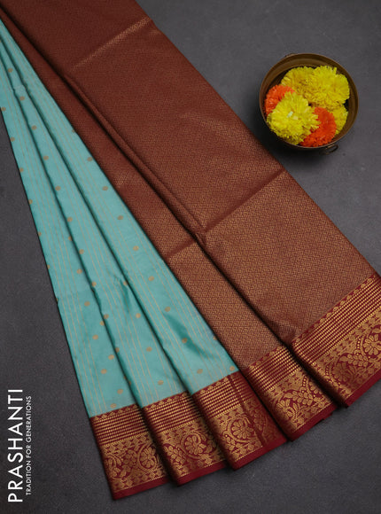 Semi soft silk saree teal blue and maroon with allover zari weaves & buttas and zari woven border