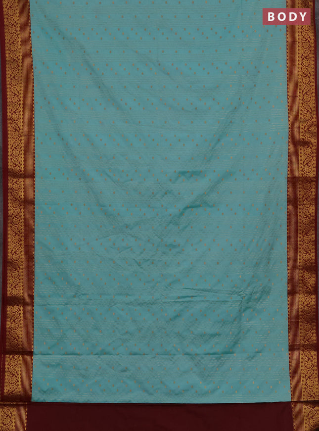Semi soft silk saree teal blue and maroon with allover zari weaves & buttas and zari woven border