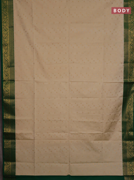 Semi soft silk saree cream and green with allover zari weaves & buttas and zari woven border