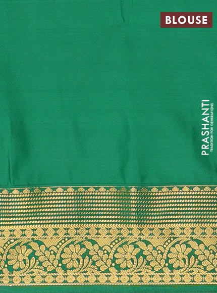 Semi soft silk saree purple and green with allover zari weaves & buttas and zari woven border