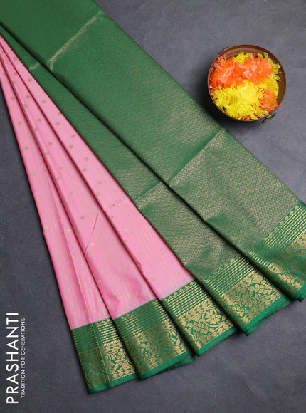Semi soft silk saree peach pink and green with allover zari weaves & buttas and zari woven border