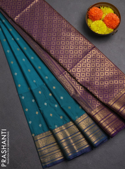Semi soft silk saree teal green and purple with allover silver & gold zari woven buttas and zari woven border
