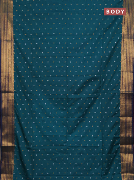 Semi soft silk saree teal green and purple with allover silver & gold zari woven buttas and zari woven border