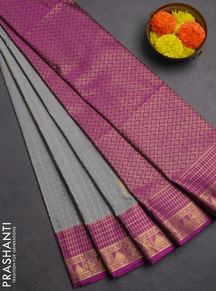 Semi soft silk saree grey and magenta pink with allover zari woven buttas and zari woven border