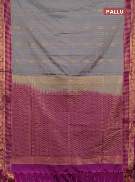 Semi soft silk saree grey and magenta pink with allover zari woven buttas and zari woven border