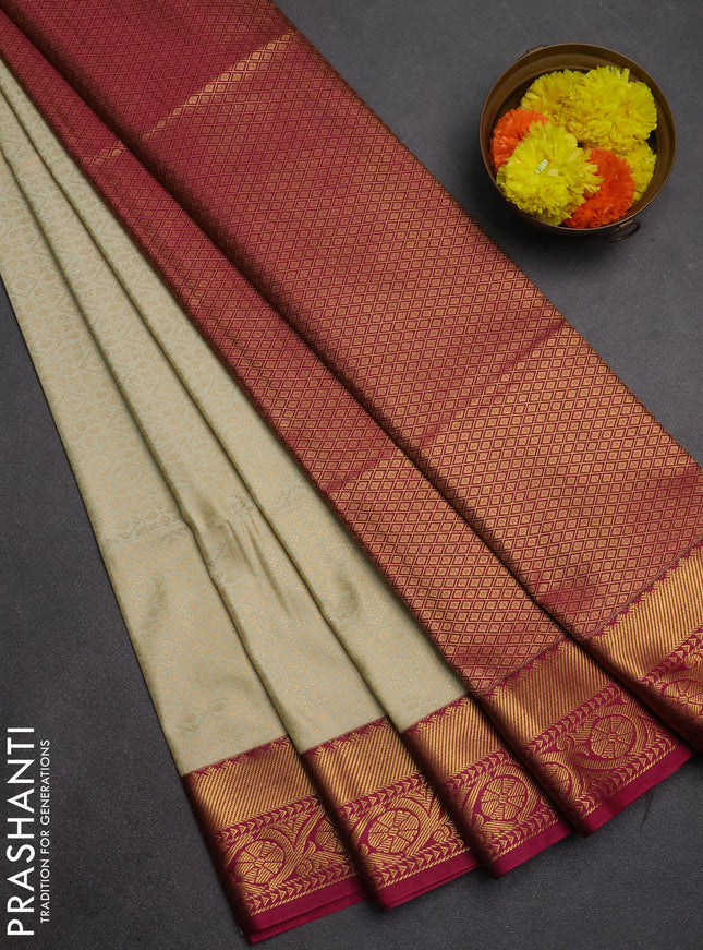 Semi soft silk saree pista green and pink with allover zari checks & buttas and zari woven border