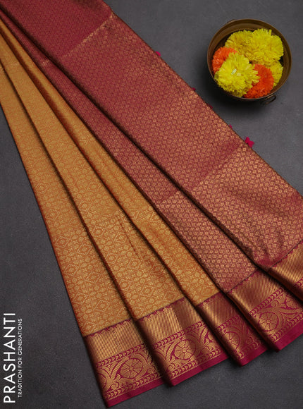 Semi soft silk saree mustard yellow and pink with allover zari checks & buttas and zari woven border