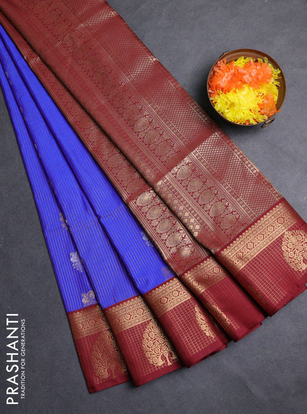 Semi soft silk saree blue and maroon with allover zari weaves & buttas and zari woven border
