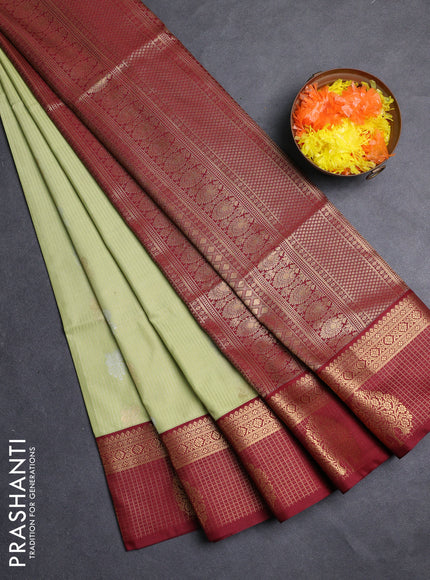 Semi soft silk saree pista green and maroon with allover zari weaves & buttas and zari woven border