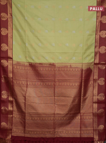 Semi soft silk saree pista green and maroon with allover zari weaves & buttas and zari woven border