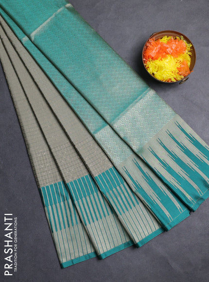 Semi soft silk saree pastel green and dark mustard with allover zari checks & buttas and long zari woven border