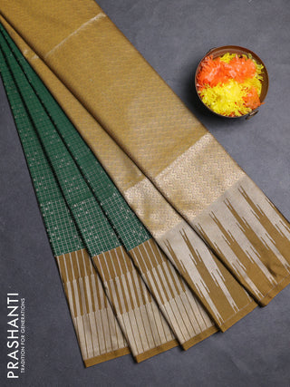 Semi soft silk saree green and dark mustard with allover zari checks & buttas and long zari woven border