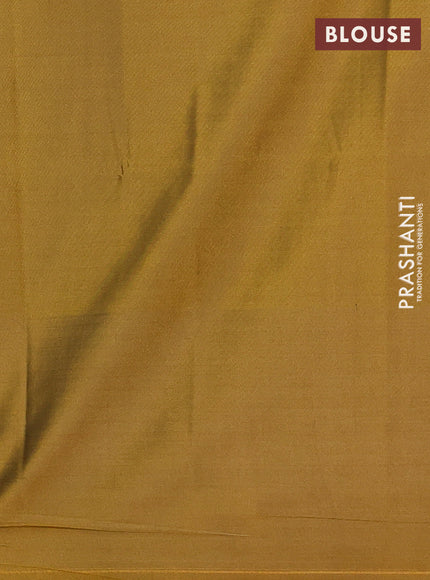 Semi soft silk saree green and dark mustard with allover zari checks & buttas and long zari woven border