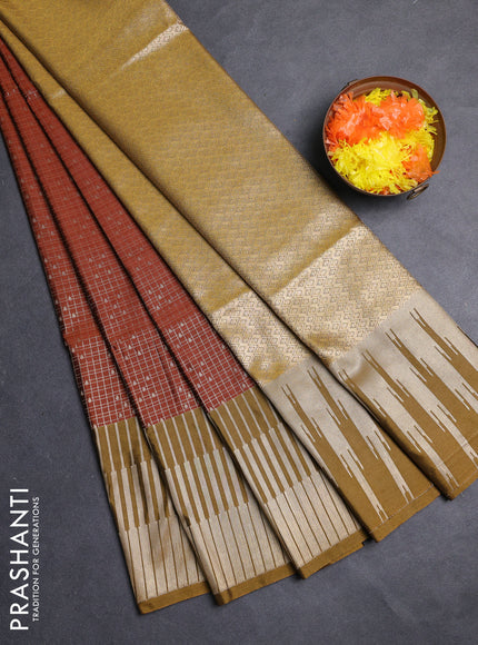 Semi soft silk saree rust shade and dark mustard with allover zari checks & buttas and long zari woven border