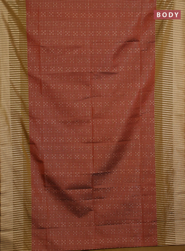 Semi soft silk saree rust shade and dark mustard with allover zari checks & buttas and long zari woven border
