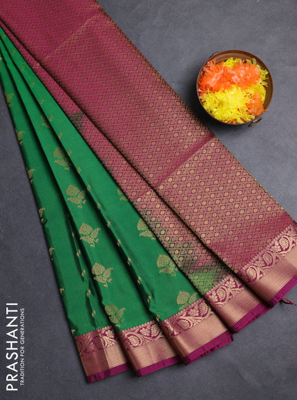 Semi soft silk saree green and pink with allover zari woven buttas and zari woven border