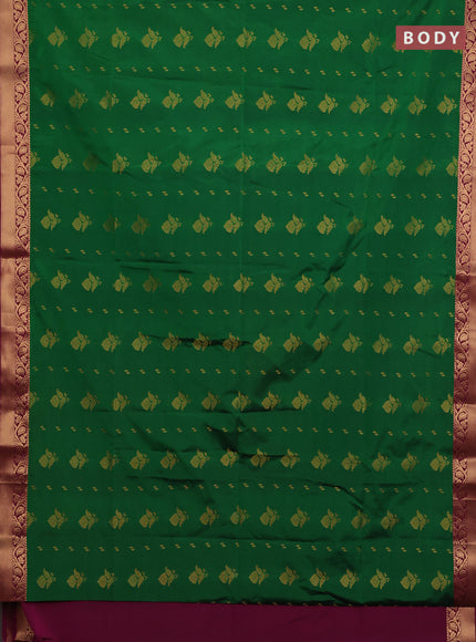 Semi soft silk saree green and pink with allover zari woven buttas and zari woven border
