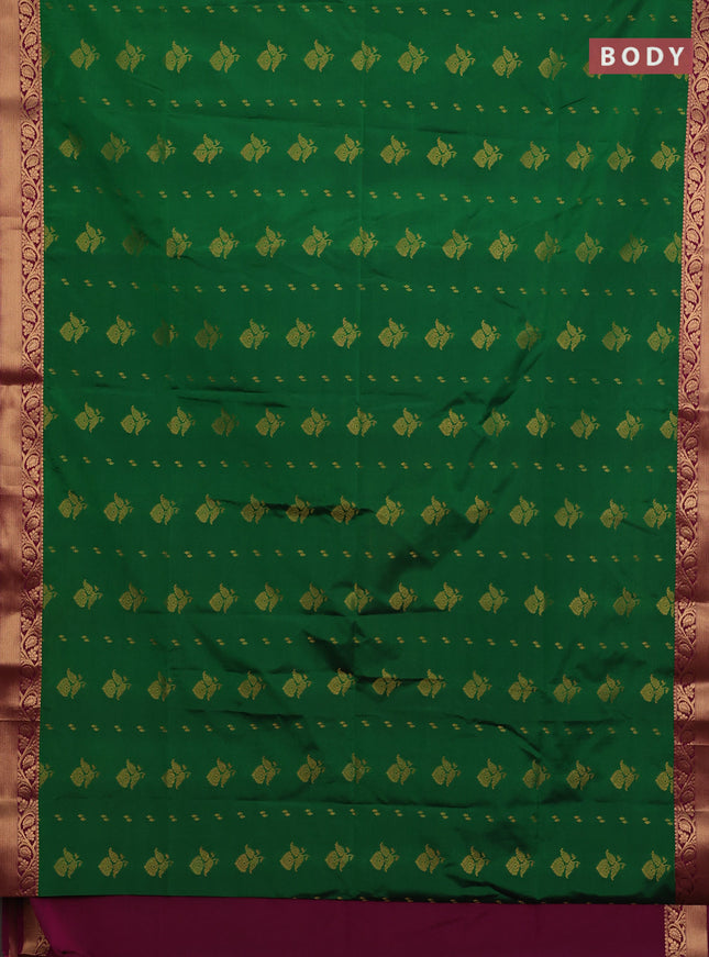Semi soft silk saree green and pink with allover zari woven buttas and zari woven border