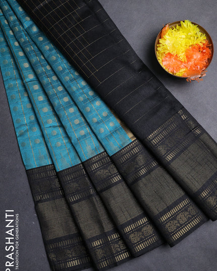 Semi dupion saree teal blue shade and black with allover zari checks & 1000 buttas and long temple zari woven border