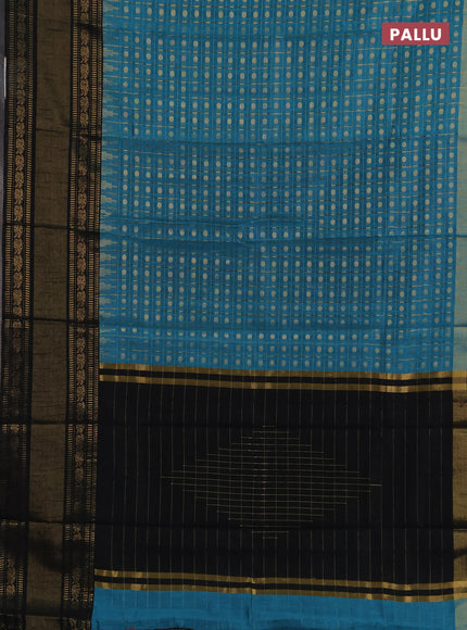 Semi dupion saree teal blue shade and black with allover zari checks & 1000 buttas and long temple zari woven border