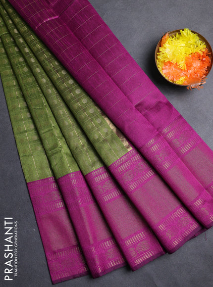 Semi dupion saree mehendi green and purple with allover zari checks & 1000 buttas and long temple zari woven border