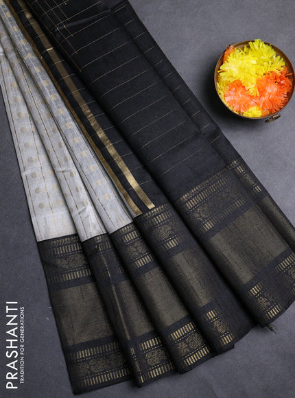 Semi dupion saree grey and black with allover zari checks & 1000 buttas and long temple zari woven border