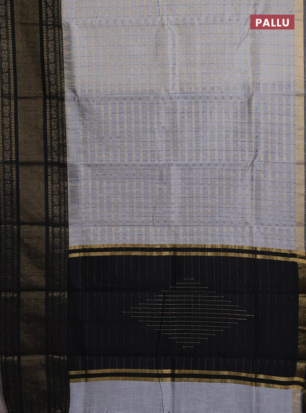 Semi dupion saree grey and black with allover zari checks & 1000 buttas and long temple zari woven border