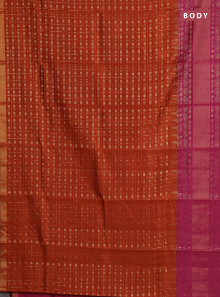 Semi dupion saree rust shade and pink with allover zari checks & 1000 buttas and long temple zari woven border