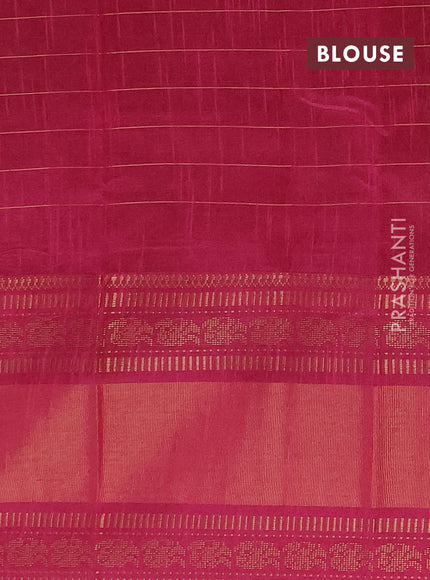 Semi dupion saree green and magenta pink with allover zari checks & 1000 buttas and long temple zari woven border