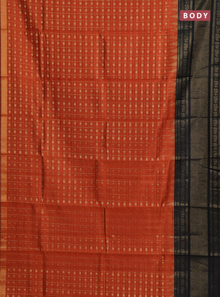 Semi dupion saree rust shade and black with allover zari checks & 1000 buttas and long temple zari woven border