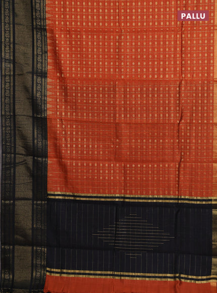 Semi dupion saree rust shade and black with allover zari checks & 1000 buttas and long temple zari woven border