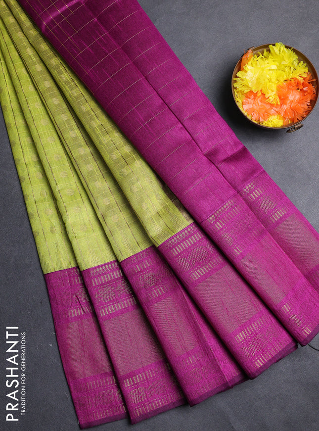 Semi dupion saree light green and purple with allover zari checks & 1000 buttas and long temple zari woven border